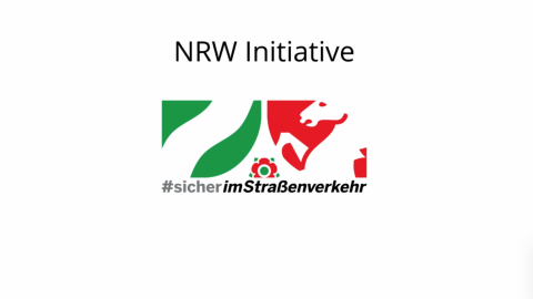 Das Logo der NRW Initiative - #sicherimStraßenverkehr mit dem Schriftzug "NRW Initiative" darüber